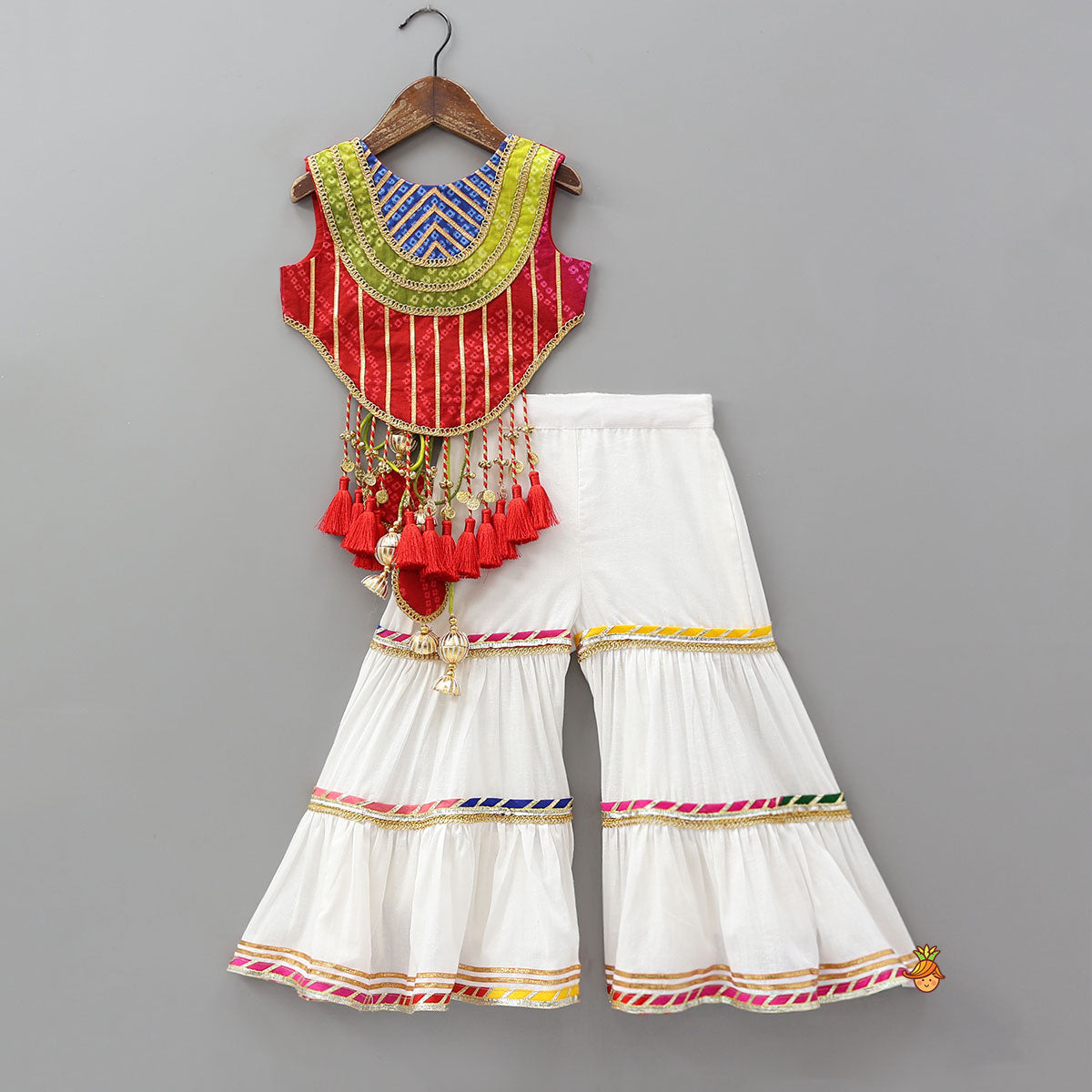 Pre Order: Curved Hem Bandhani Printed Top And Tiered Sharara With Bandhana