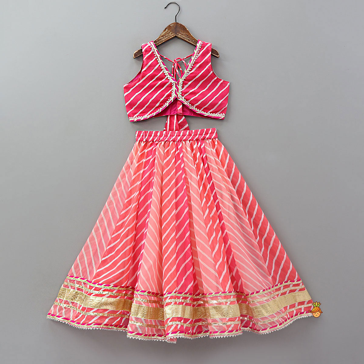 Pre Order: Vibrant Leheriya Printed Crop Top And Lehenga With Dupatta