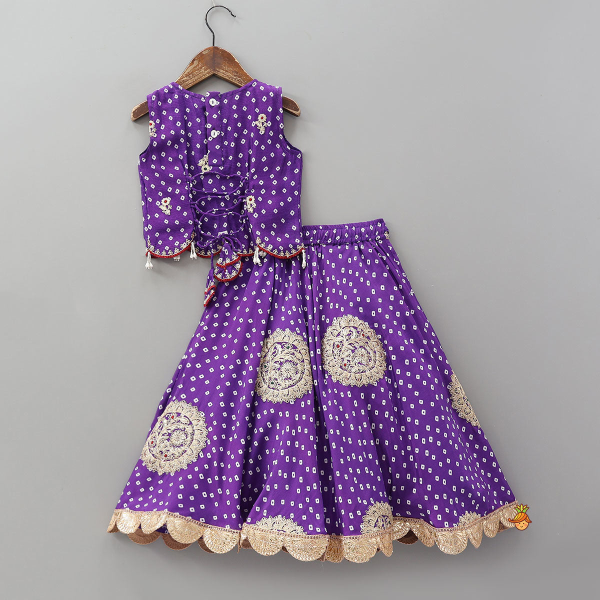 Pre Order: Bandhani Printed Crop Top And Embroidered Lehenga With Dupatta And Potli Bag