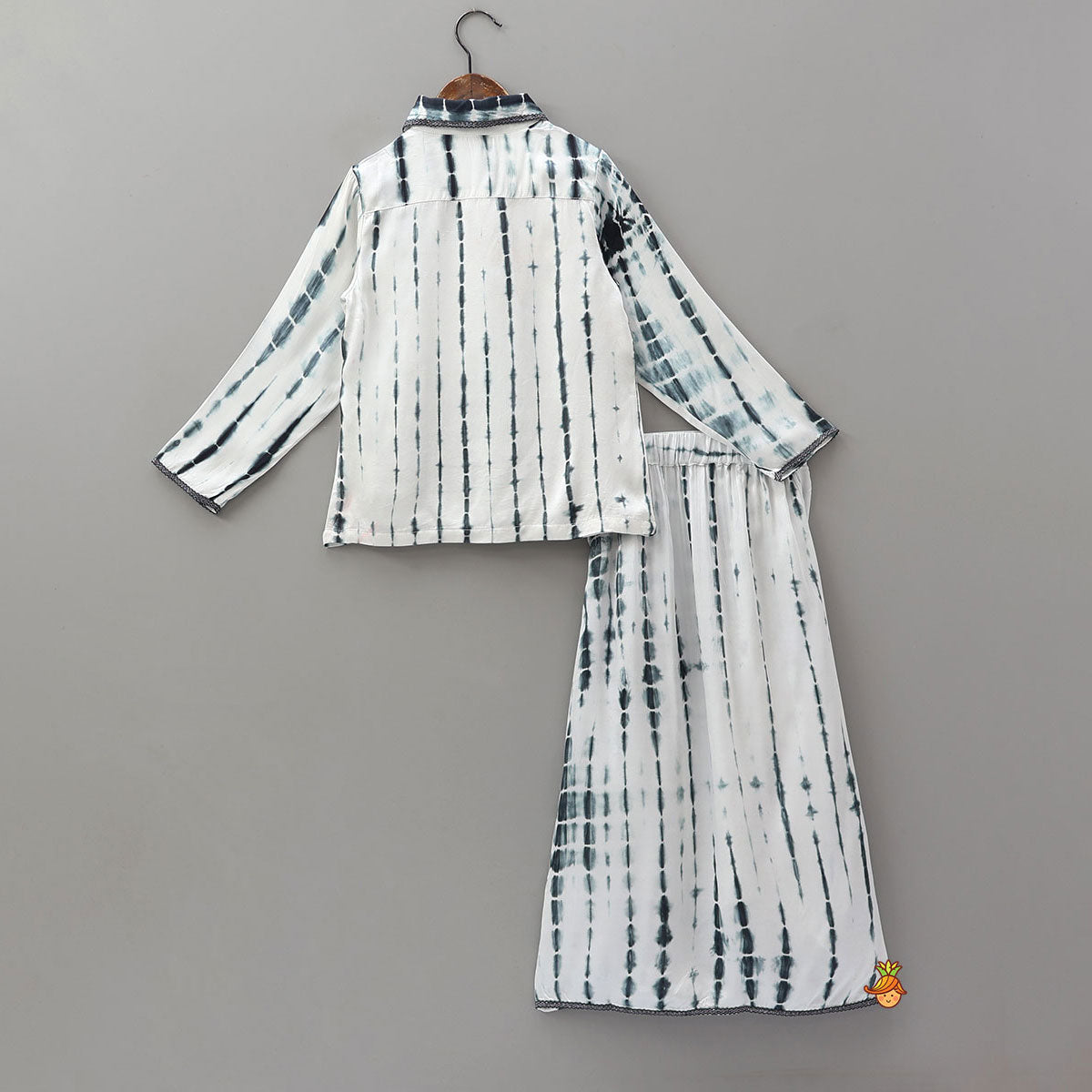 Pre Order: Tie Dye Shibori Printed Shirt Style Top And Asymmetric Lehenga Skirt