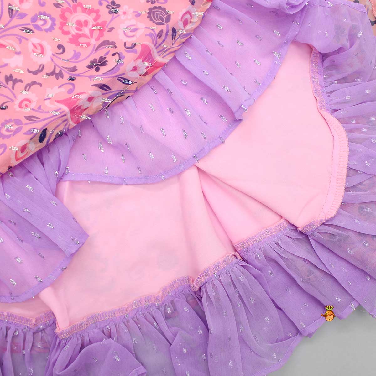 Contrasting Frills Enhanced Pink Kurti And Palazzo