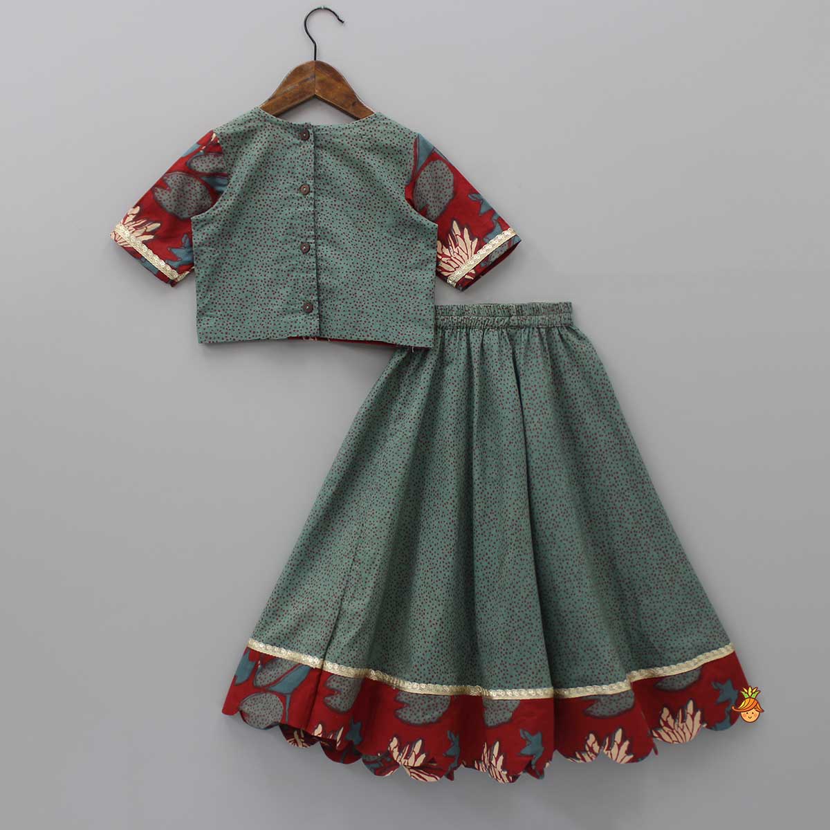 Pre Order: Fringes Enhanced Sage Green Top And Dots Printed Scalloped Lehenga