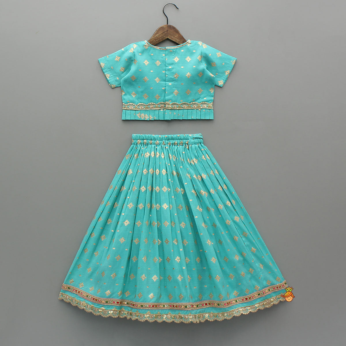 Pre Order: Chanderi Embroidered Teal Green Top And Lehenga With Contrasting Dupatta