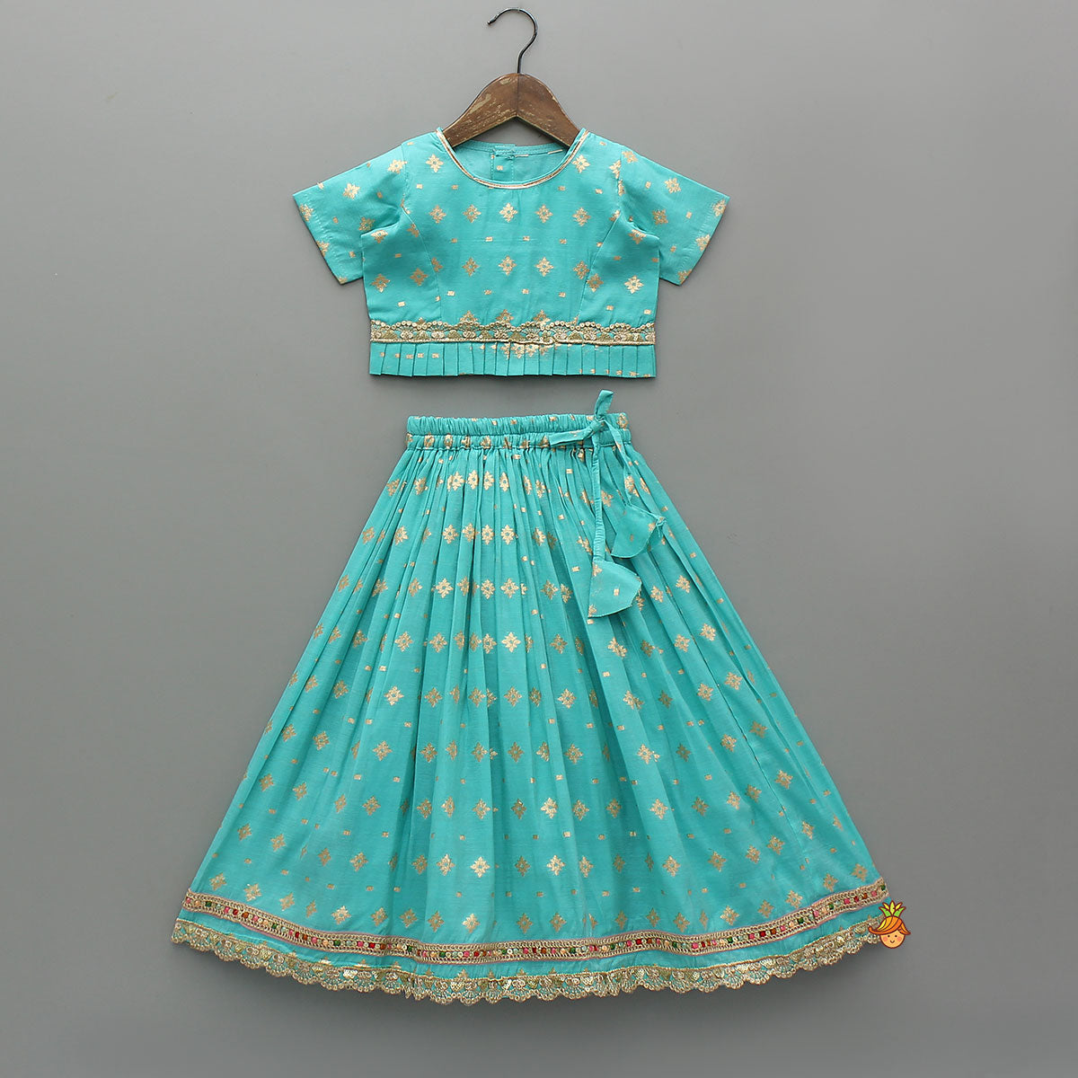 Pre Order: Chanderi Embroidered Teal Green Top And Lehenga With Contrasting Dupatta