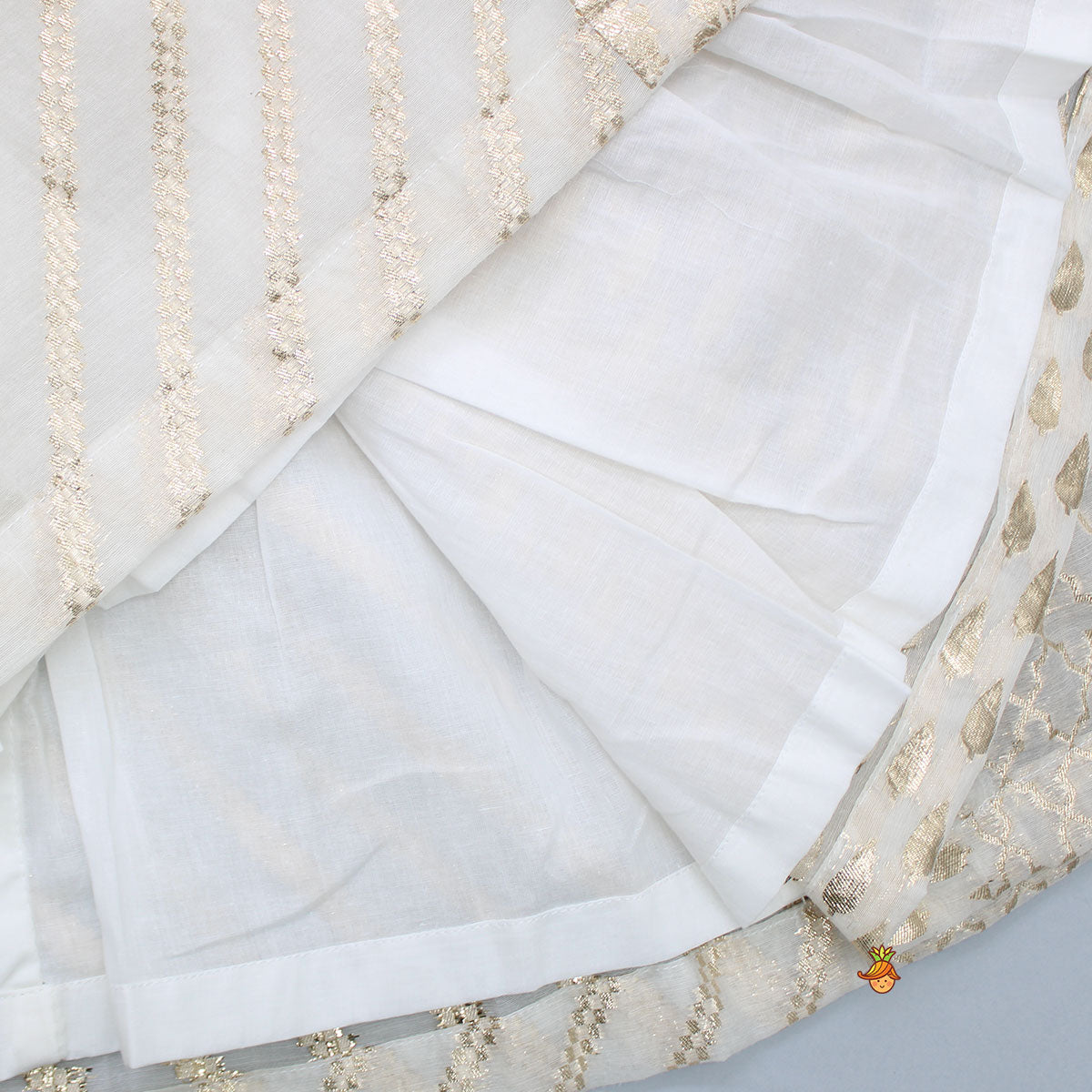 Pre Order: Organza Off White Frilly Top And Chanderi Embroidered Lehenga