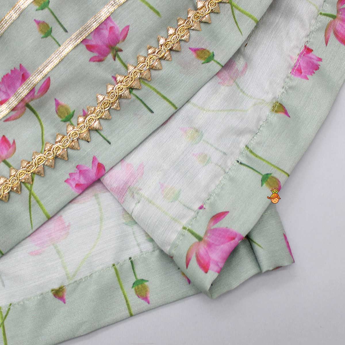 Pre Order: Mint Green Angarkha Style Top And Gota Lace Detailed Baby Pink Dhoti With Matching Mukut