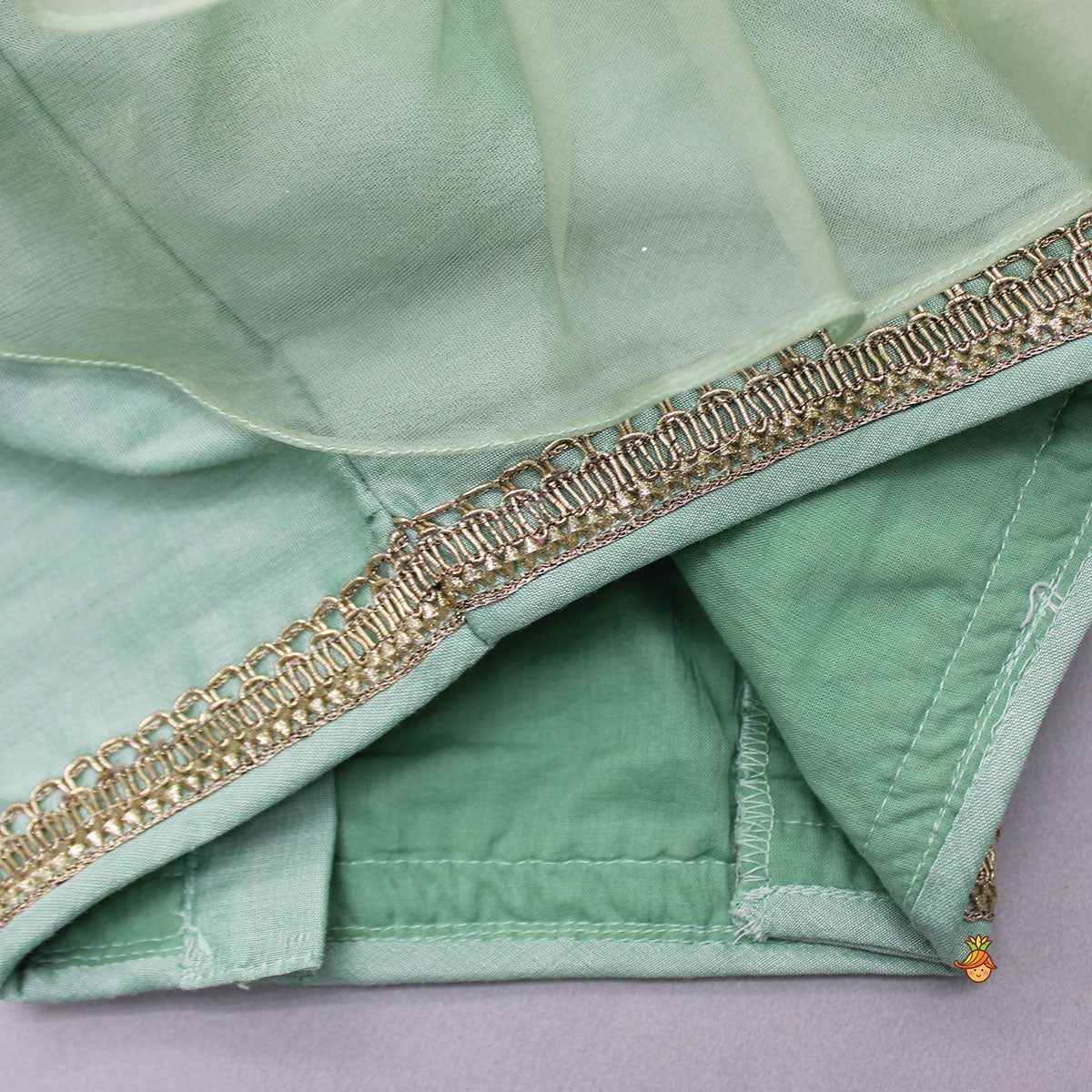 Pre Order: Organza Triple Layered Flap Mint Green Top And Zari Embroidered Lehenga