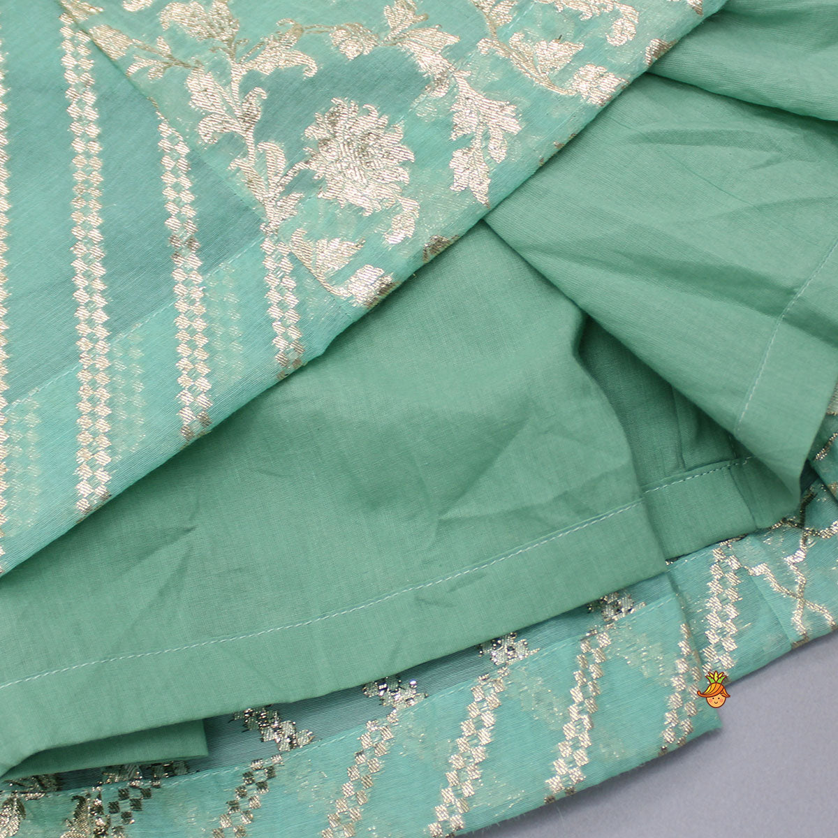 Pre Order: Organza Triple Layered Flap Mint Green Top And Zari Embroidered Lehenga