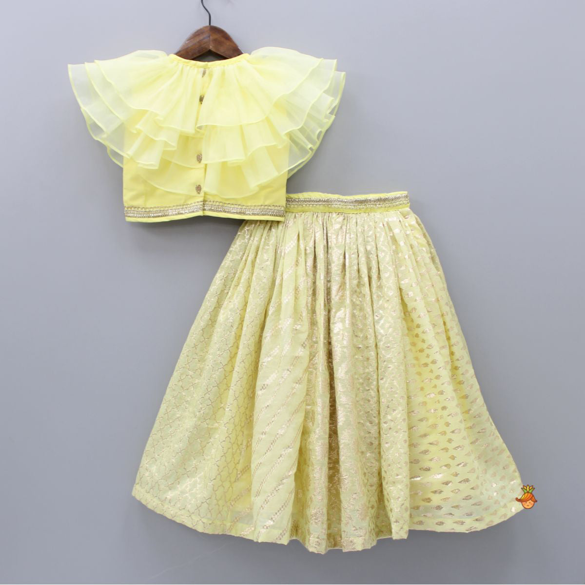 Pre Order: Organza Triple Layered Flap Pastel Yellow Top And Zari Embroidered Lehenga