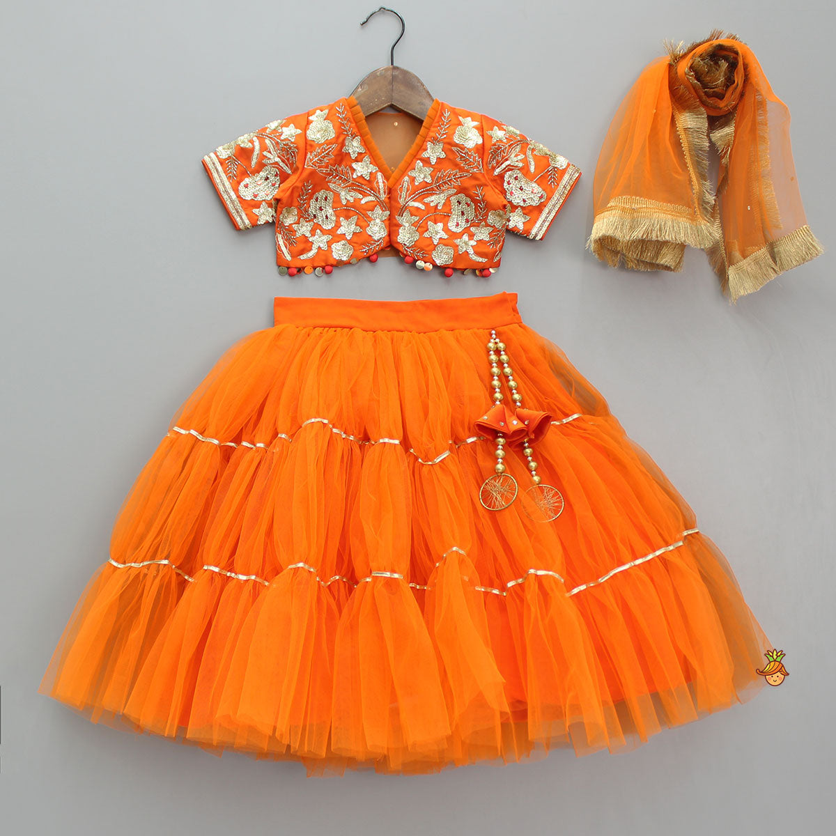 Pre Order: Front Open Embroidered Orange Top And Tiered Net Lehenga With Fringes Dupatta