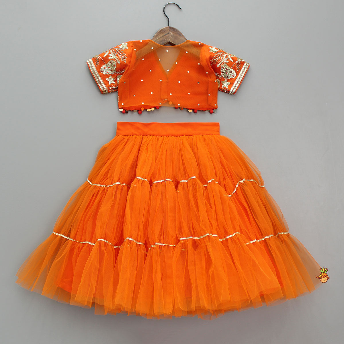 Pre Order: Front Open Embroidered Orange Top And Tiered Net Lehenga With Fringes Dupatta