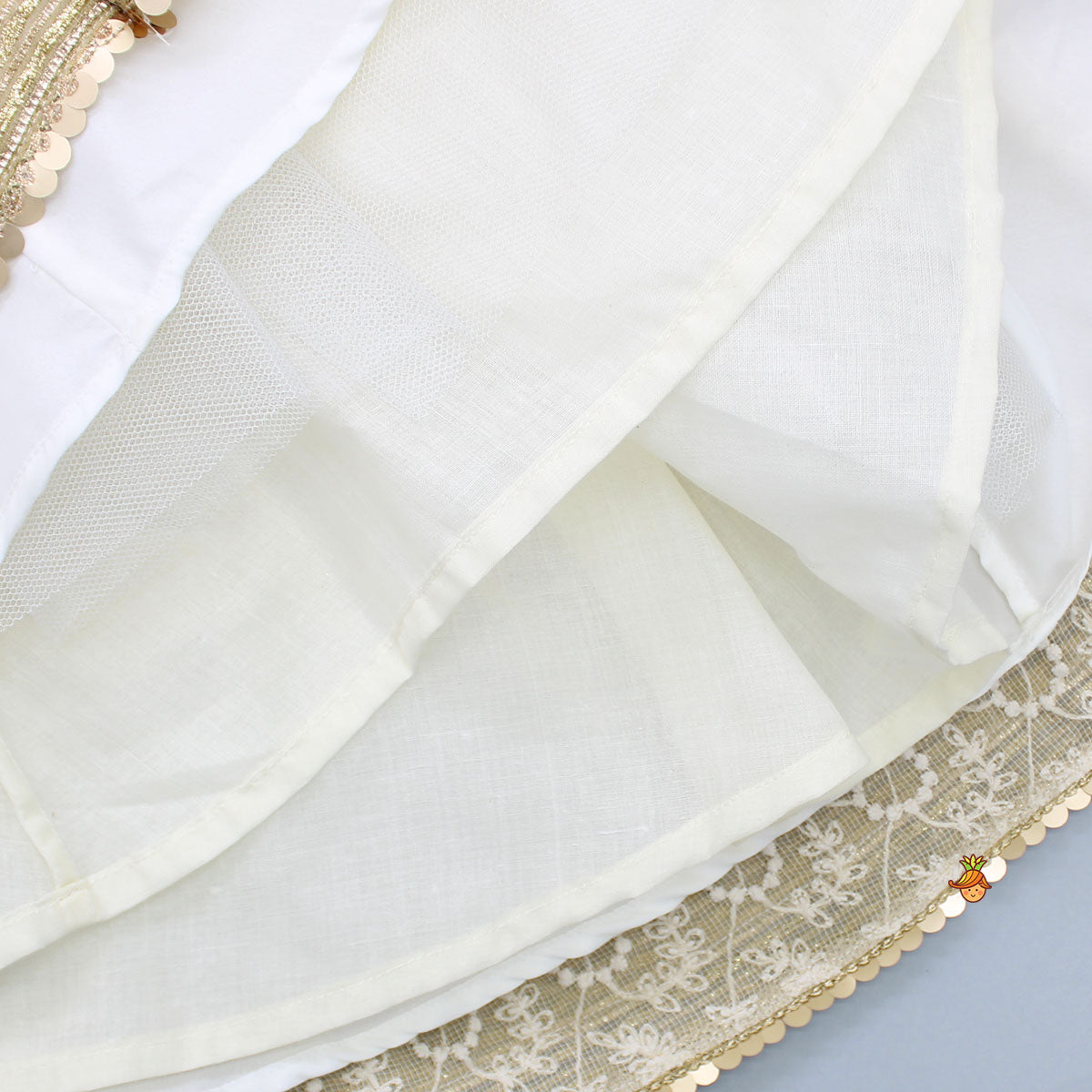 Pre Order: Round Neck Off White Top And Shimmer Tassels Enhanced Lehenga With Organza Dupatta