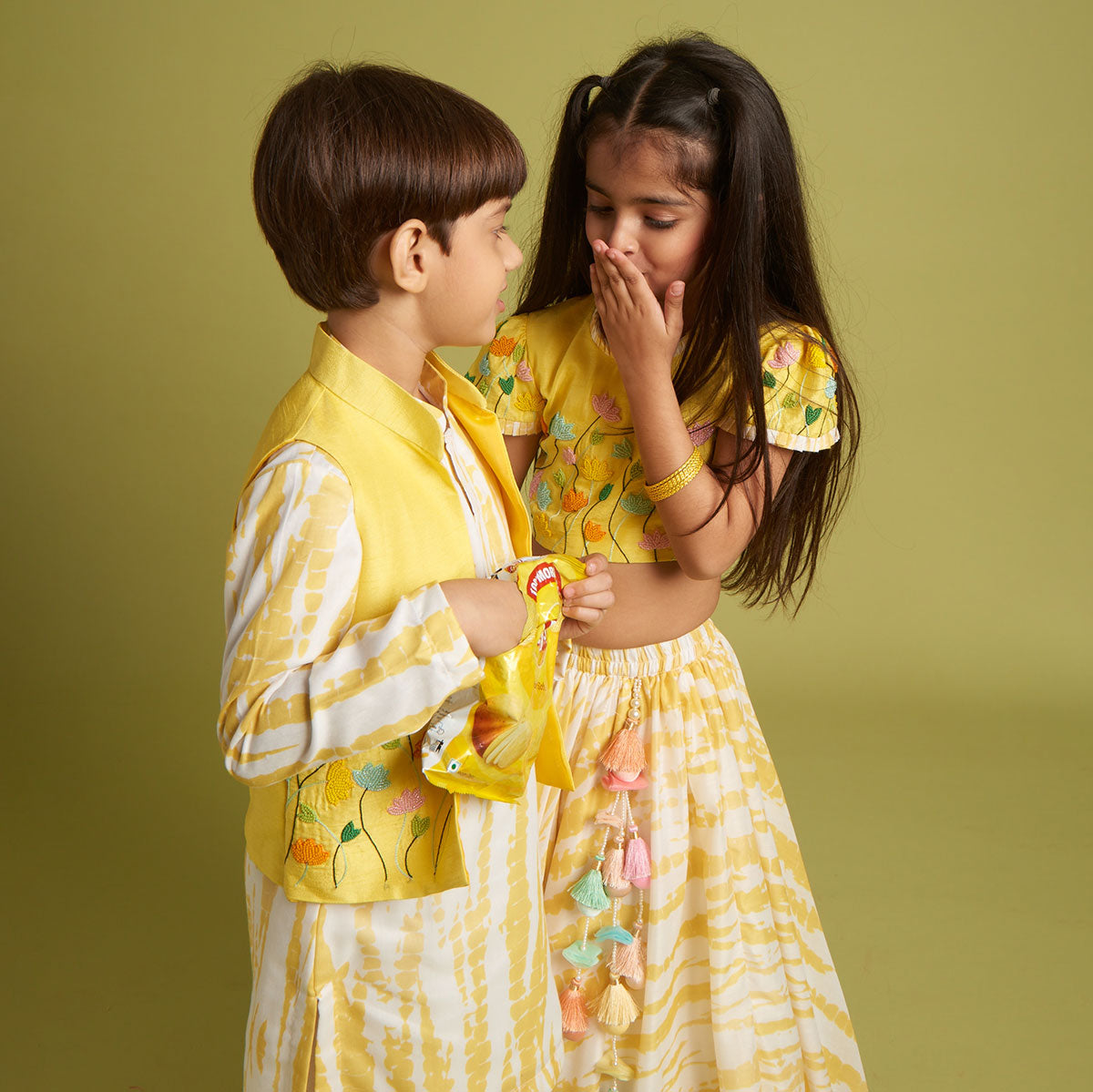 Beaded Yellow Top And Shibori Printed Lehenga With Ruffle Dupatta twinning model image 4