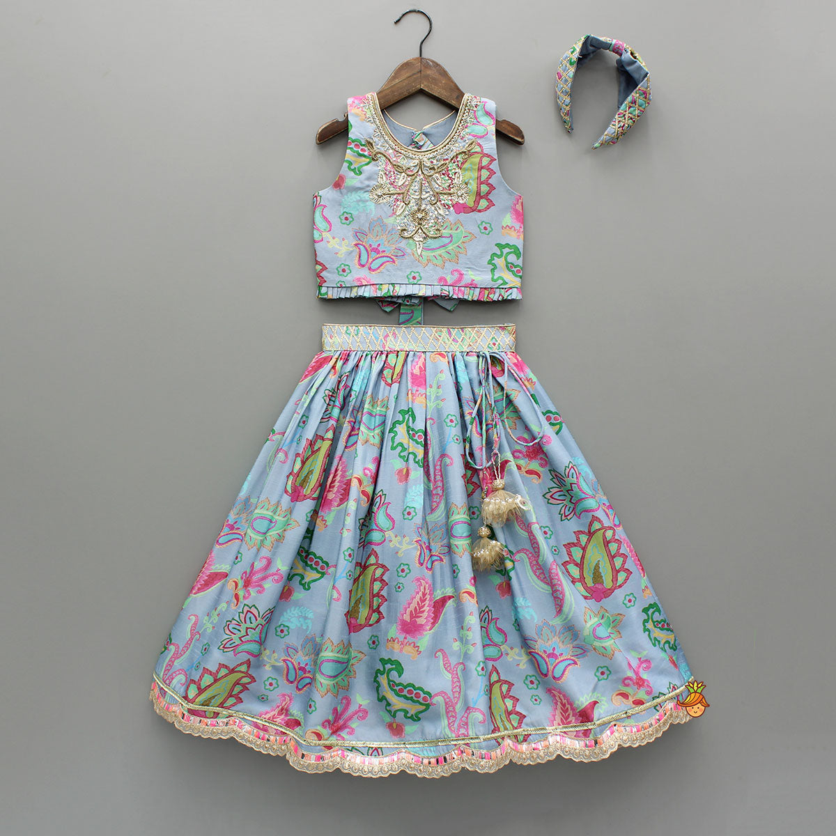 Pre Order: Zardozi Embroidered Pleated Hem Blue Top And Lehenga With Checks Hair Band