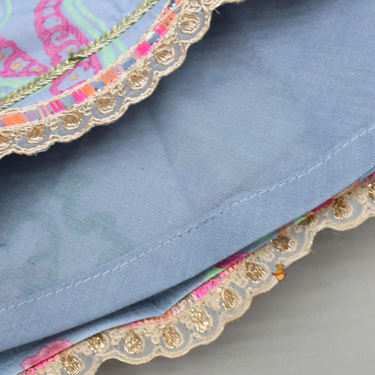 Pre Order: Zardozi Embroidered Pleated Hem Blue Top And Lehenga With Checks Hair Band