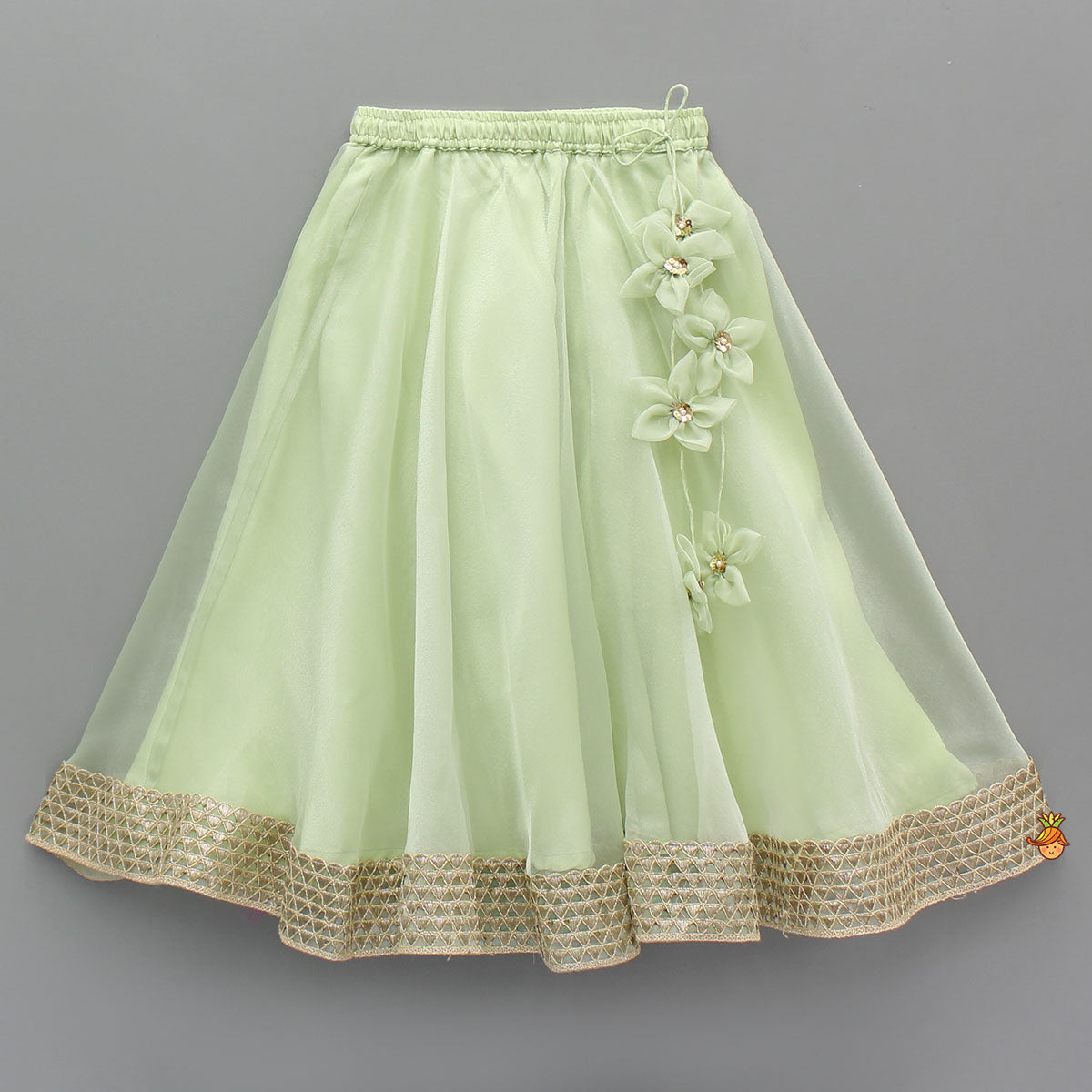 Pre Order: Floral Embroidered Green Sleeveless Top And Fabric Flower Tassels Adorned Lehenga With Ruffle Dupatta