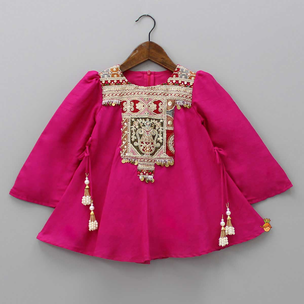 Pre Order: Embroidered Yoke Tassels Enhanced Pink Kurti And Dhoti