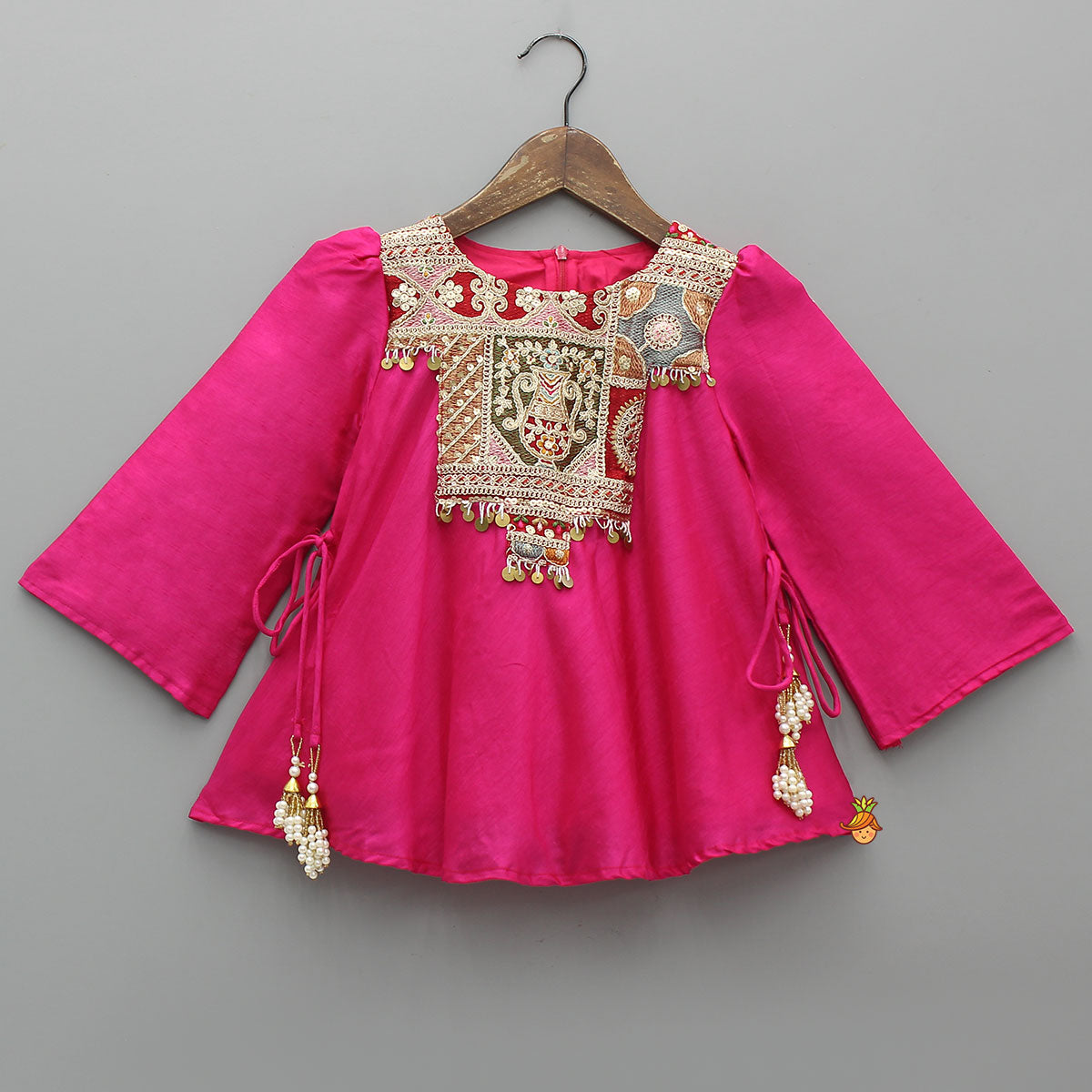 Pre Order: Embroidered Yoke Tassels Enhanced Pink Kurti And Dhoti