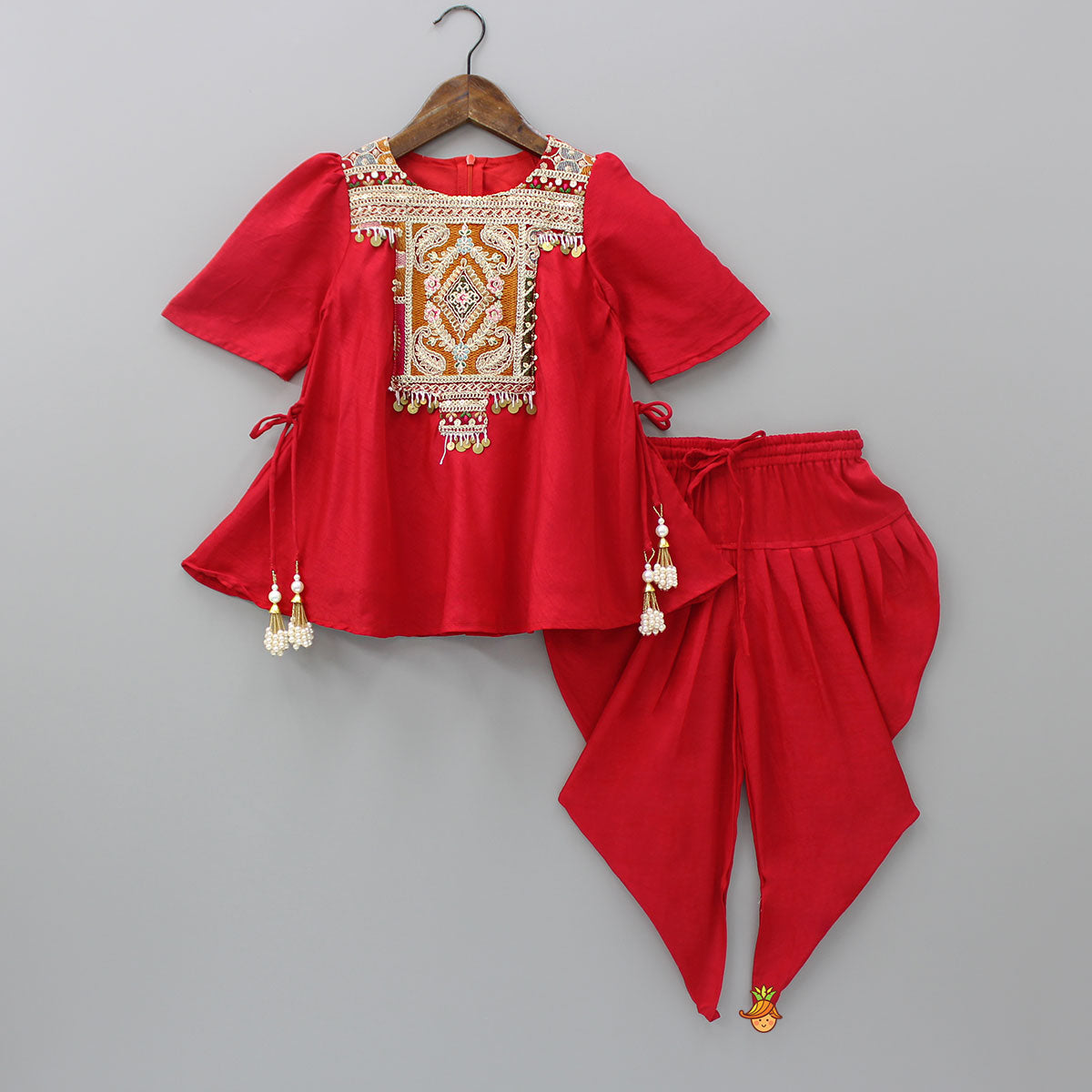 Pre Order: Embroidered Yoke Tassels Enhanced Red Kurti And Dhoti