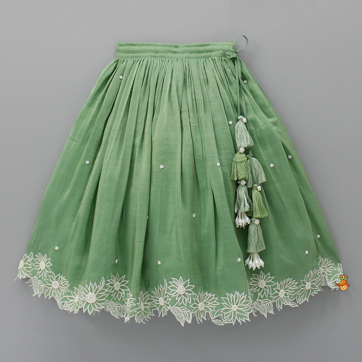 Pre Order: Pleated Neckline Green Top And Fringes Tassels Enhanced Lehenga