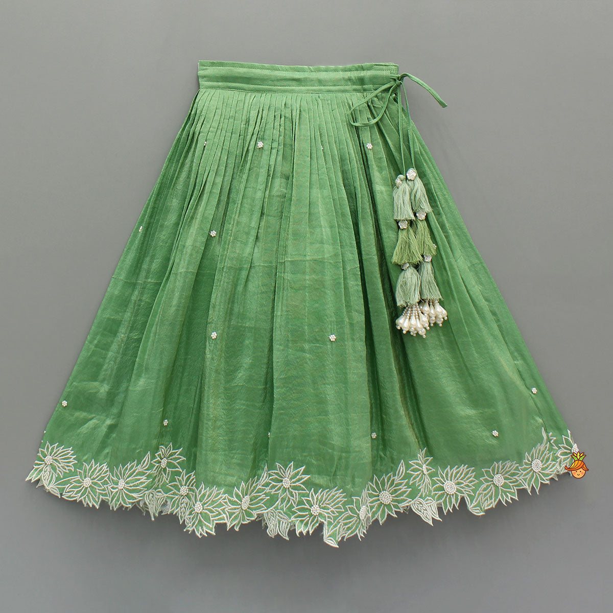 Pre Order: Pleated Neckline Green Shimmery Top And Fringes Tassels Enhanced Lehenga
