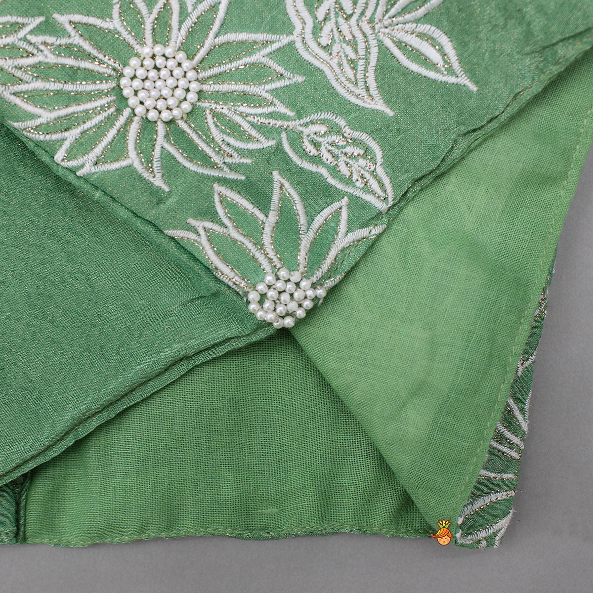Pre Order: Pleated Neckline Green Shimmery Top And Fringes Tassels Enhanced Lehenga