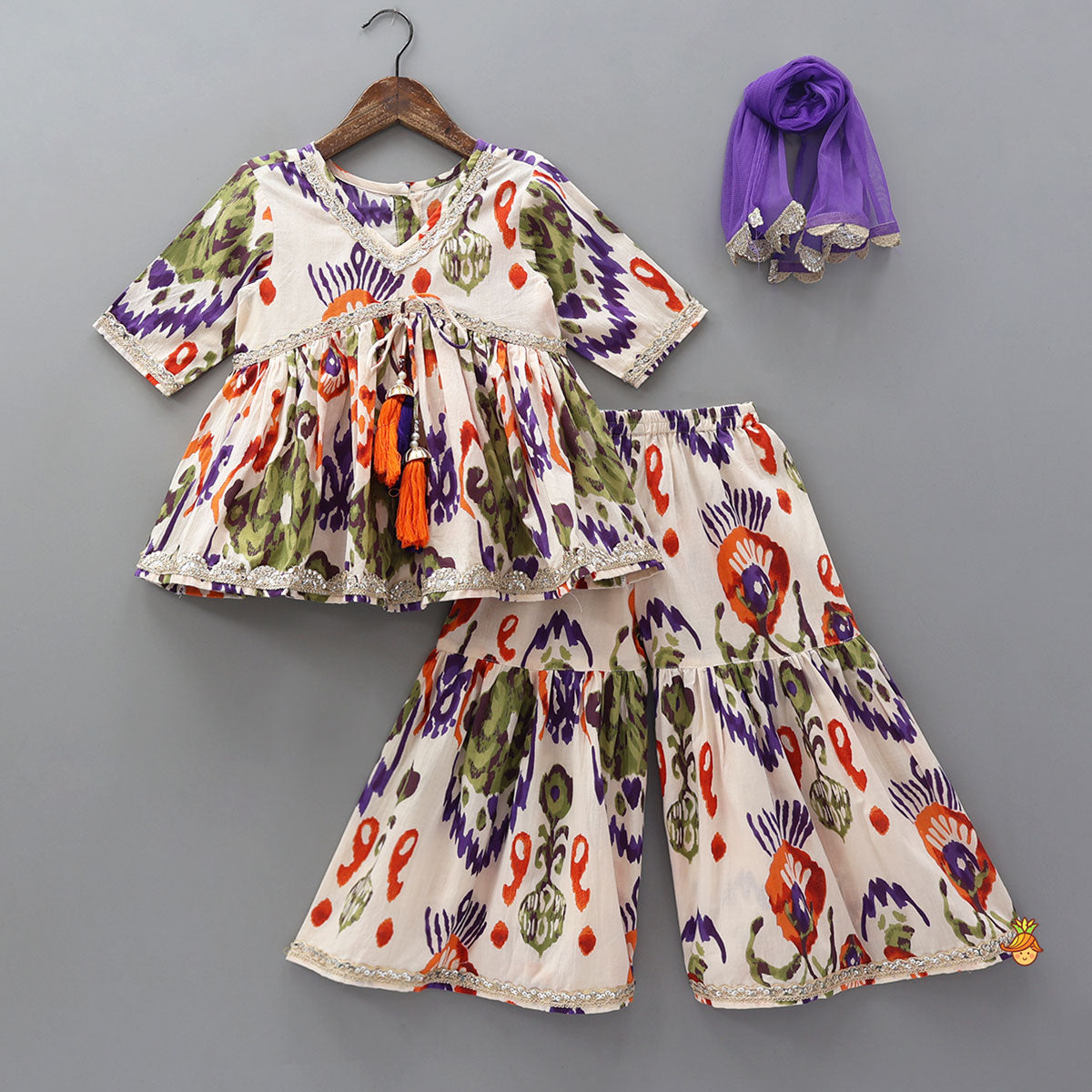 Pre Order: Tassels Enhanced Multicolour Printed Kurti And Sharara With Scalloped Lace Detail Dupatta