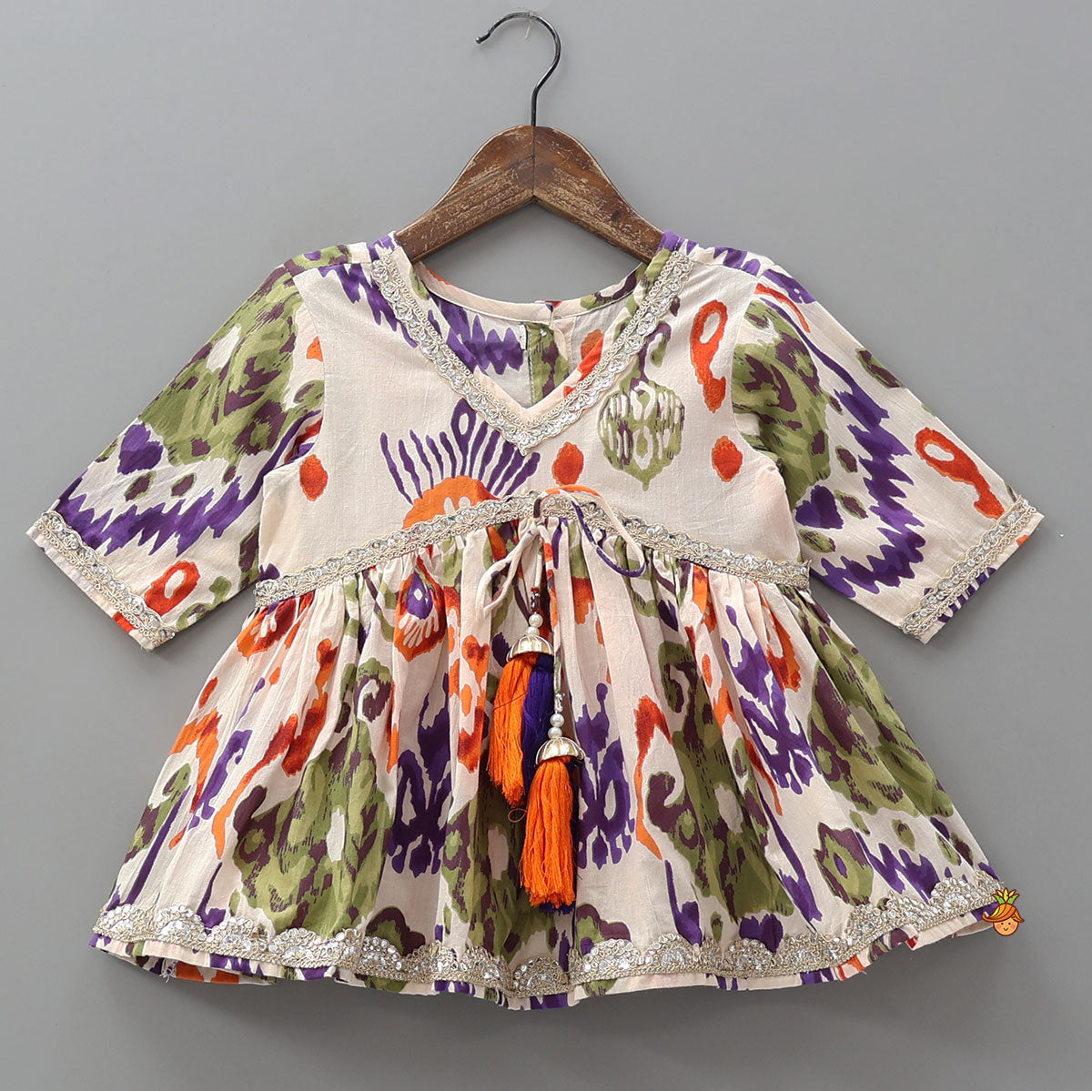 Pre Order: Tassels Enhanced Multicolour Printed Kurti And Sharara With Scalloped Lace Detail Dupatta