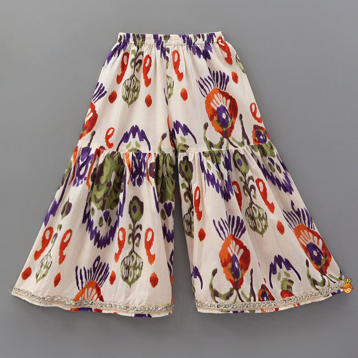 Pre Order: Tassels Enhanced Multicolour Printed Kurti And Sharara With Scalloped Lace Detail Dupatta