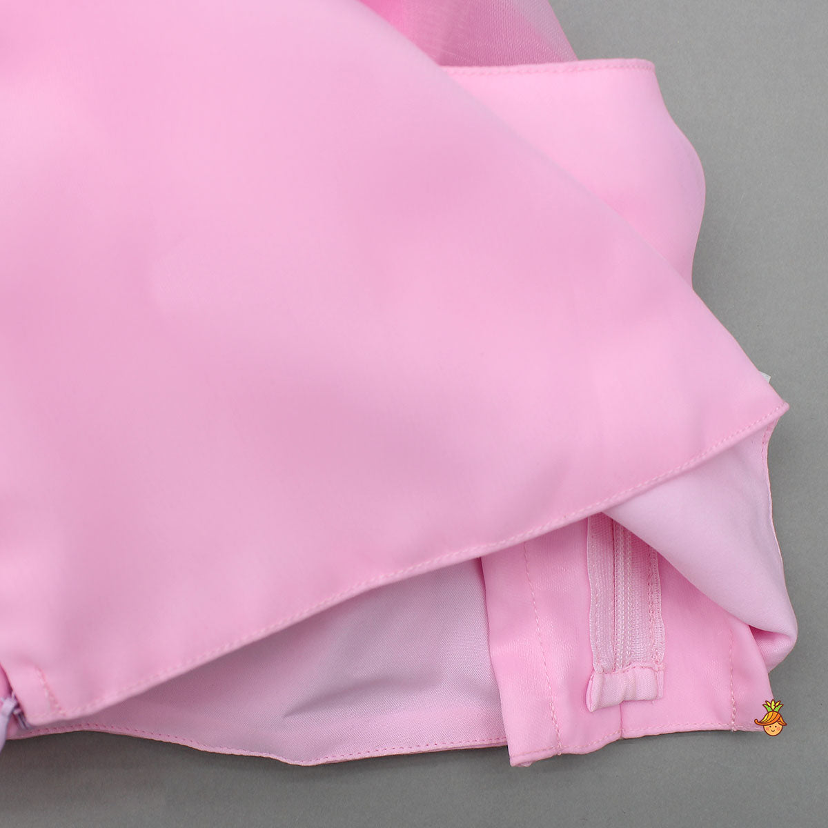 Pre Order: Organza One Shoulder Pink Top And Flower Adorned Flared Lehenga