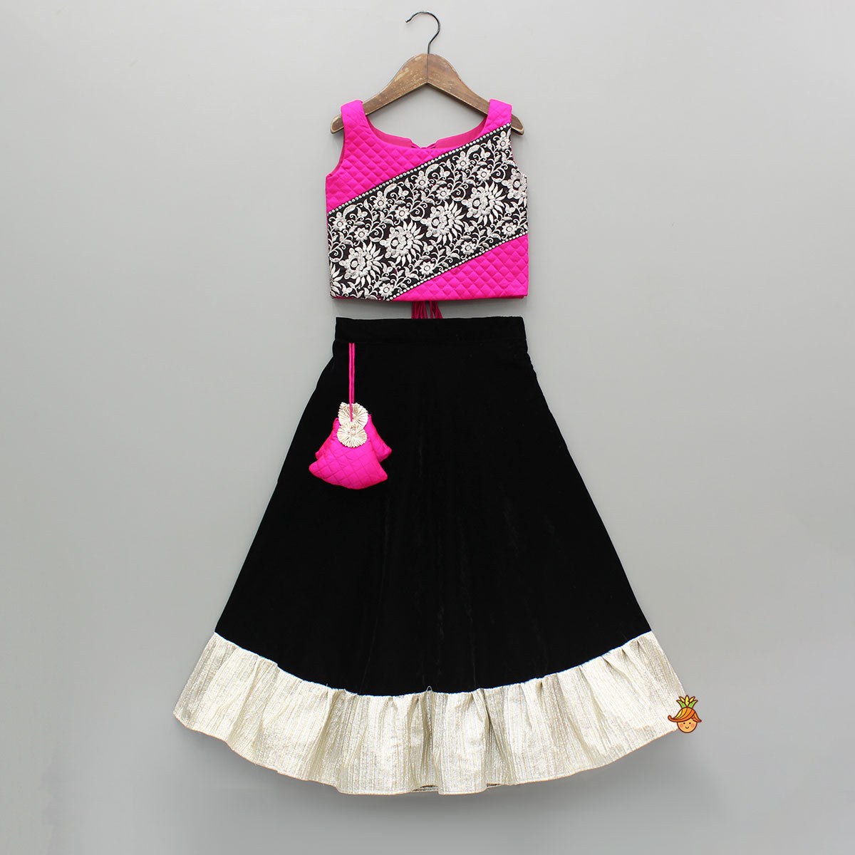 Checks Embroidered Dual Tone Top And Contrasting Tassels Enhanced Black Lehenga With Stylish Net Dupatta