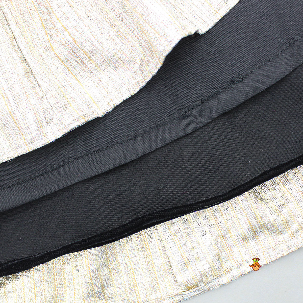 Checks Embroidered Dual Tone Top And Contrasting Tassels Enhanced Black Lehenga With Stylish Net Dupatta