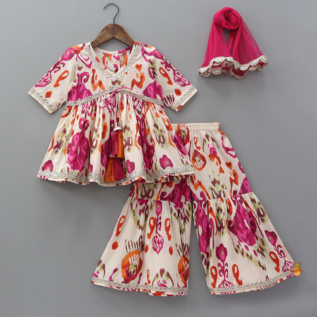 Pre Order: Tassels Enhanced Multicolour Printed Kurti And Sharara With Scalloped Lace Detail Dupatta