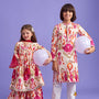 Tassels Enhanced Multicolour Printed Kurti And Sharara With Scalloped Lace Detail Pink Dupatta twinning model image 2