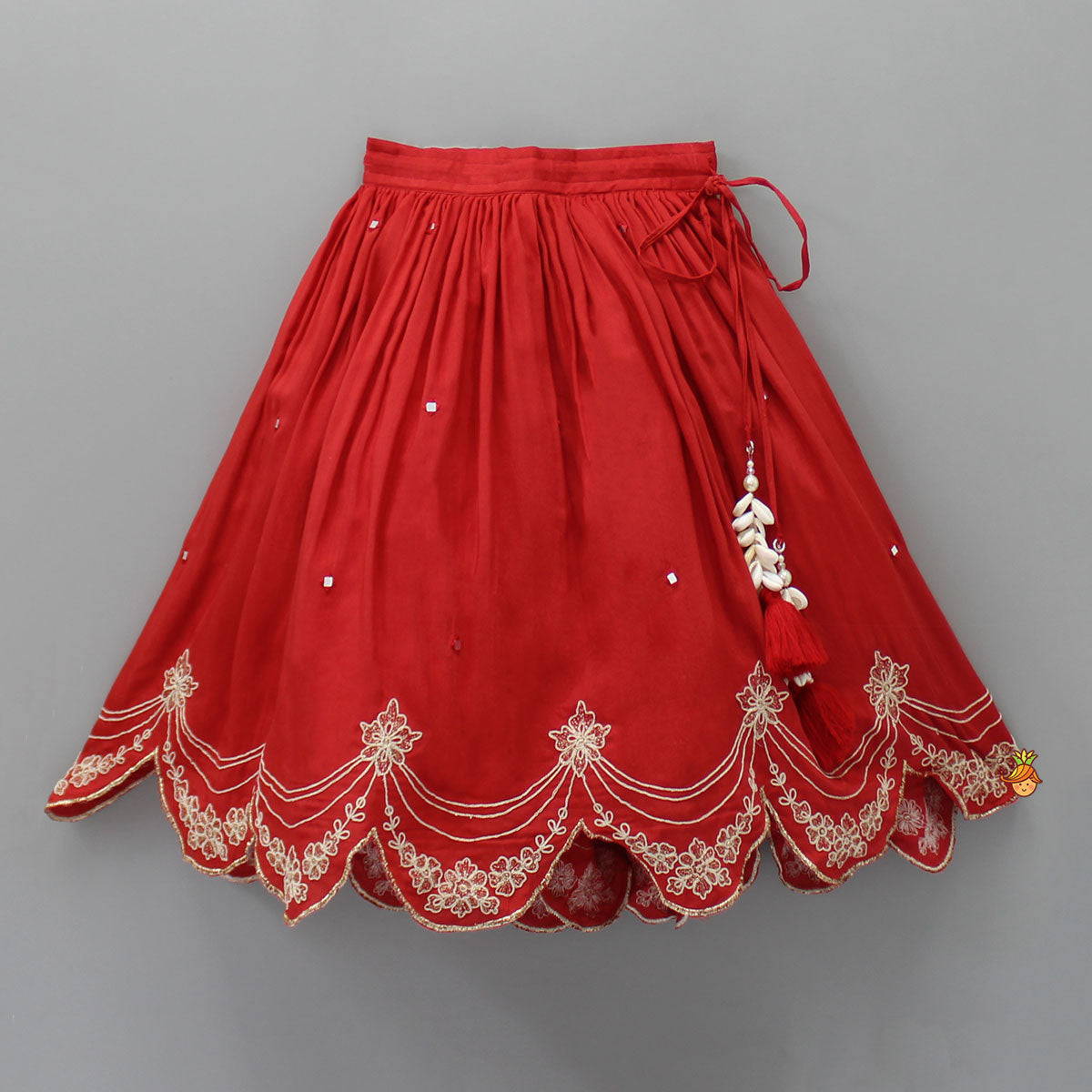 Pre Order: Dual Back Knot Detail Red Top And Tassels Enhanced Lehenga