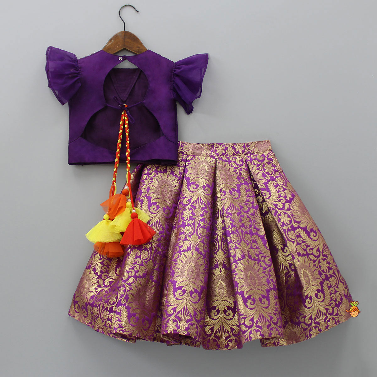 Pre Order: Stylish Cut Out Back Purple Top And Box Pleated Brocade Lehenga