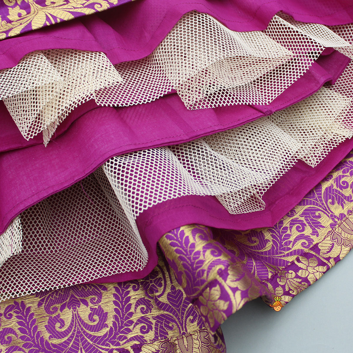 Pre Order: Stylish Cut Out Back Purple Top And Box Pleated Brocade Lehenga