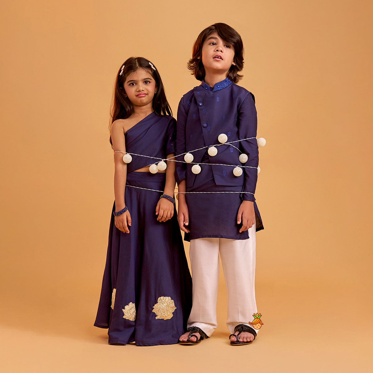 One Shoulder Blue Top And Floral Lehenga twinning model image 1
