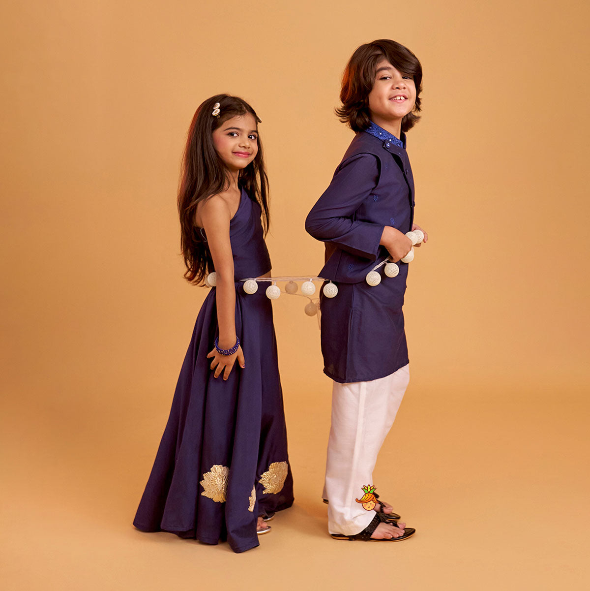 One Shoulder Blue Top And Floral Lehenga twinning model image 3