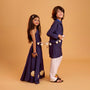 One Shoulder Blue Top And Floral Lehenga twinning model image 3