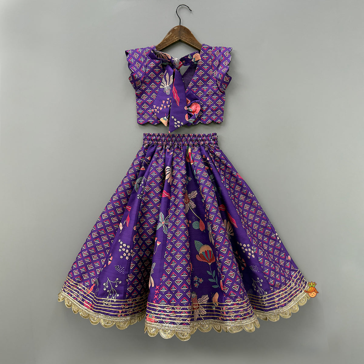 Pre Order: Scalloped Hem V Neck Purple Top And Lehenga With Matching Hair Band