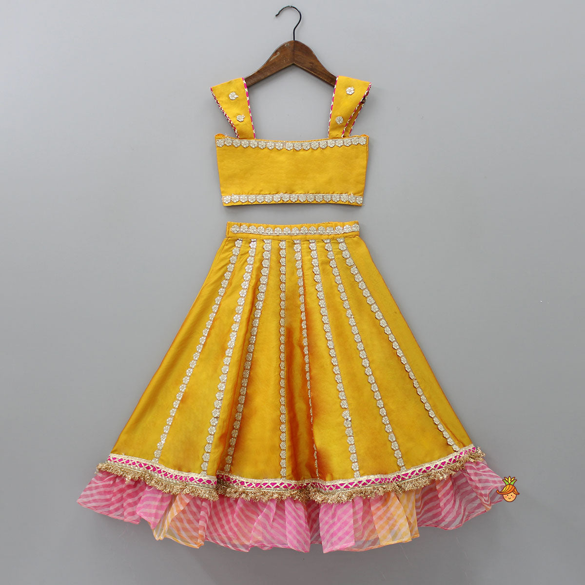 Pre Order: Mustard Top And Ruffle Hem Lehenga With Organza Cape