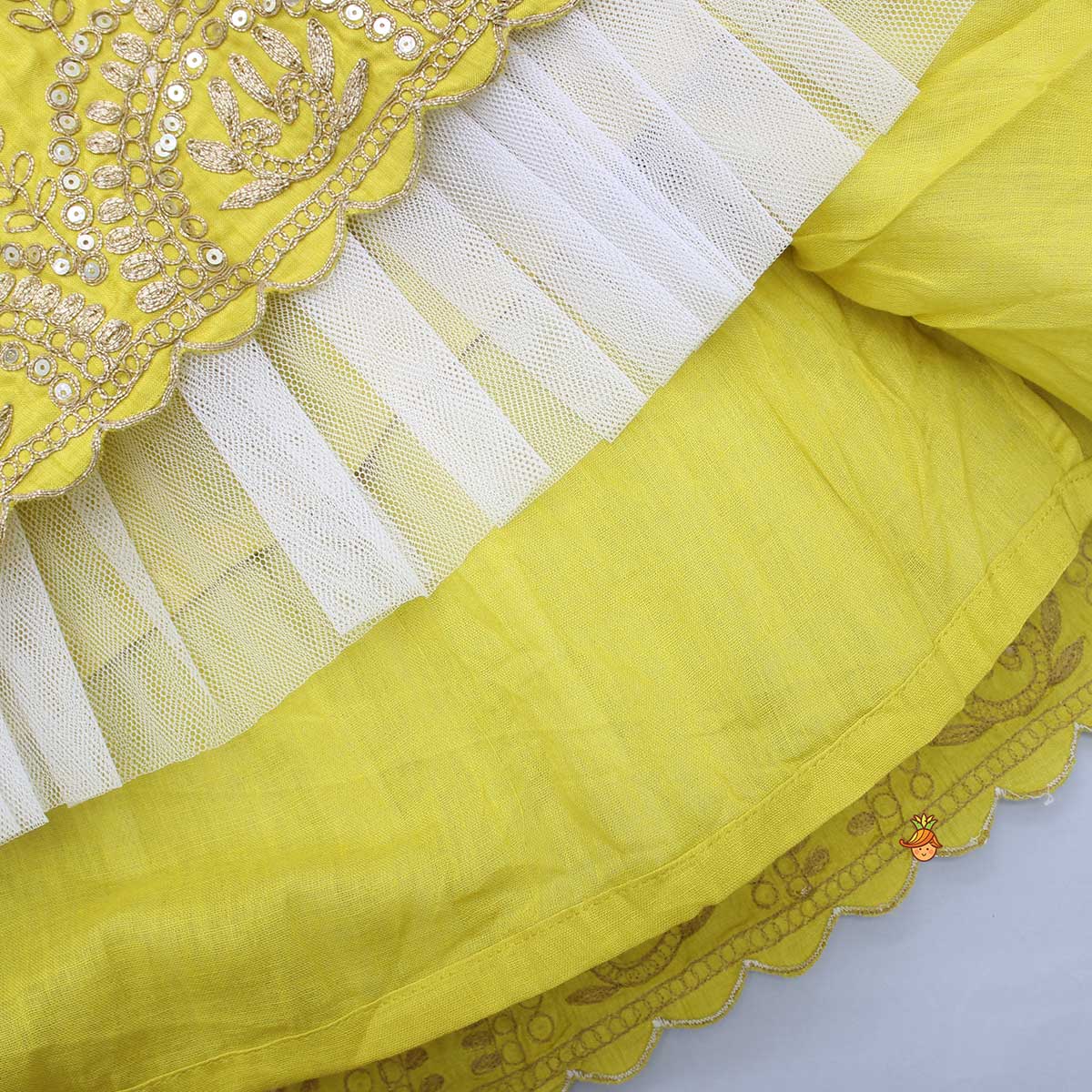 Pre Order: Pleated Armhole Buttons Back Top And Lehenga With Net Dupatta