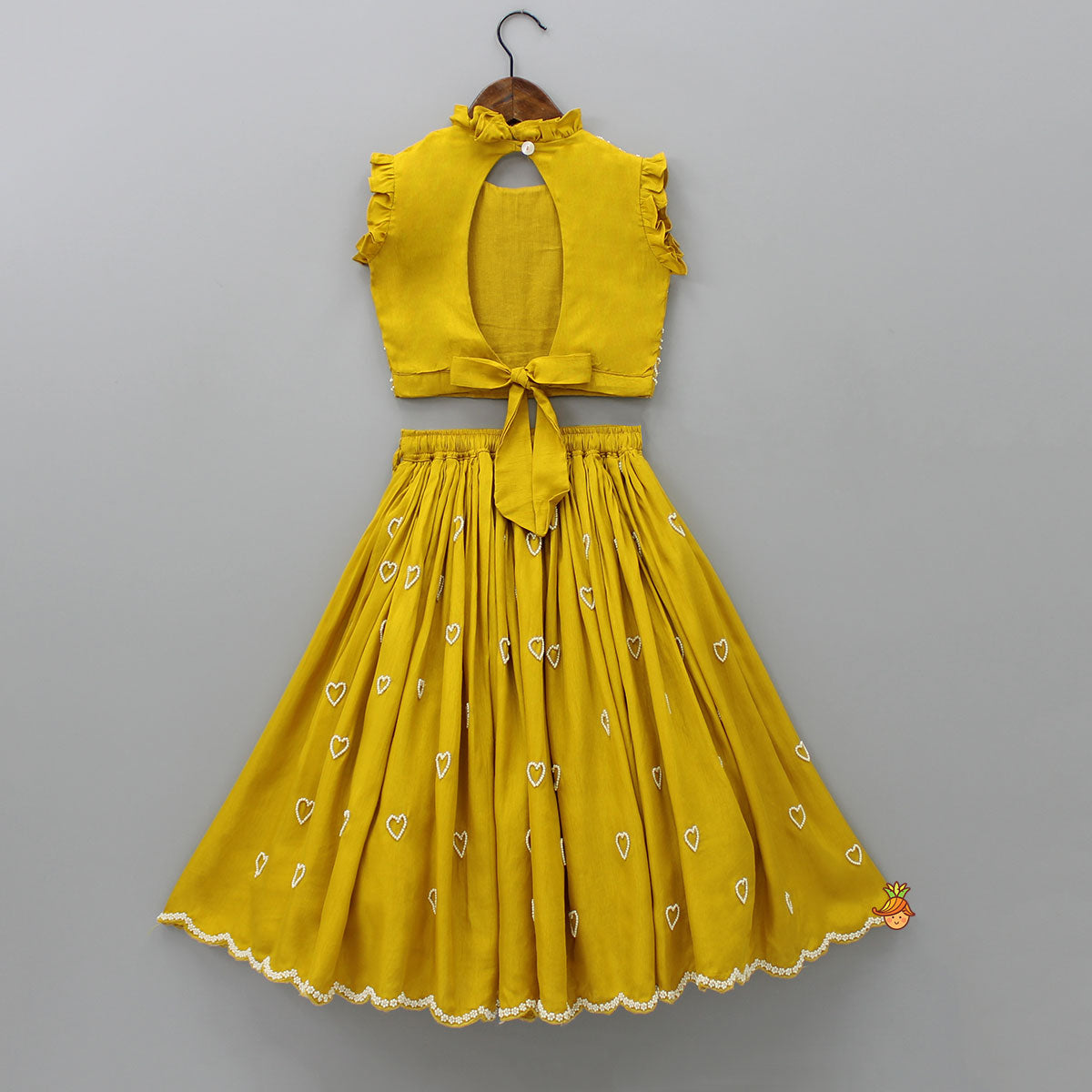 Pre Order: Ruffle Neckline Mustard Top And Lehenga