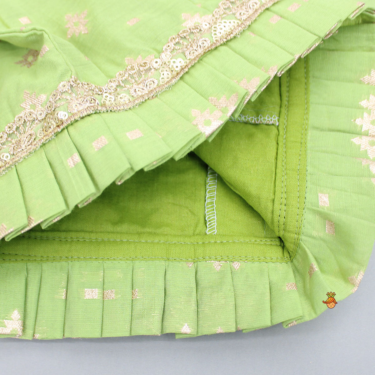 Pre Order: Pleated Hem Green Chanderi Embroidered Top And Lehenga With Net Dupatta