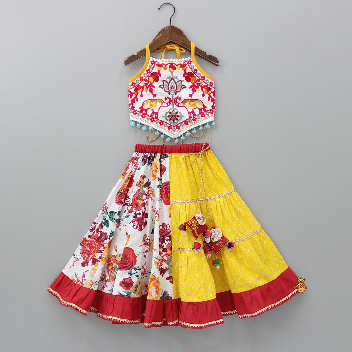 Thread-Embroidered Halter Neck Top And Multi-Printed Lehenga