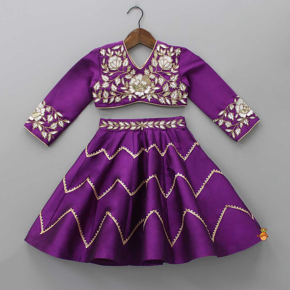 Pre Order: Purple Embroidered Top And Lehenga With Matching Net Dupatta