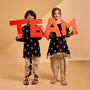 Embroidered Black Kurta And Beige Dhoti twinning model image 2