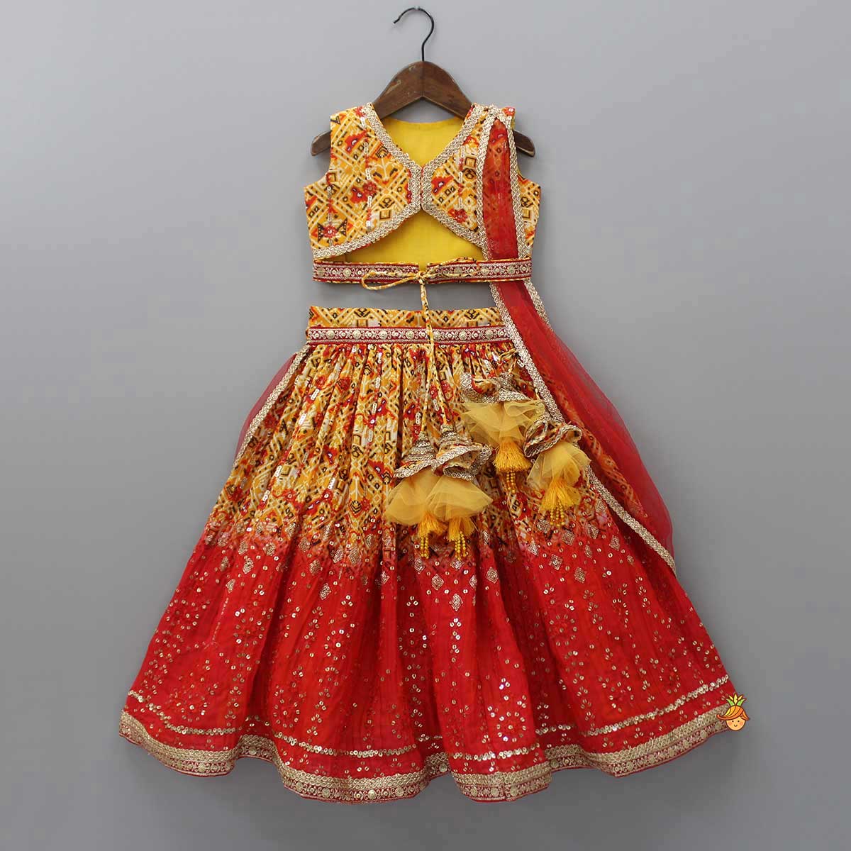 Pre Order: Embroidered Patola Printed Stylish Top And Lehenga With Detachable Net Dupatta