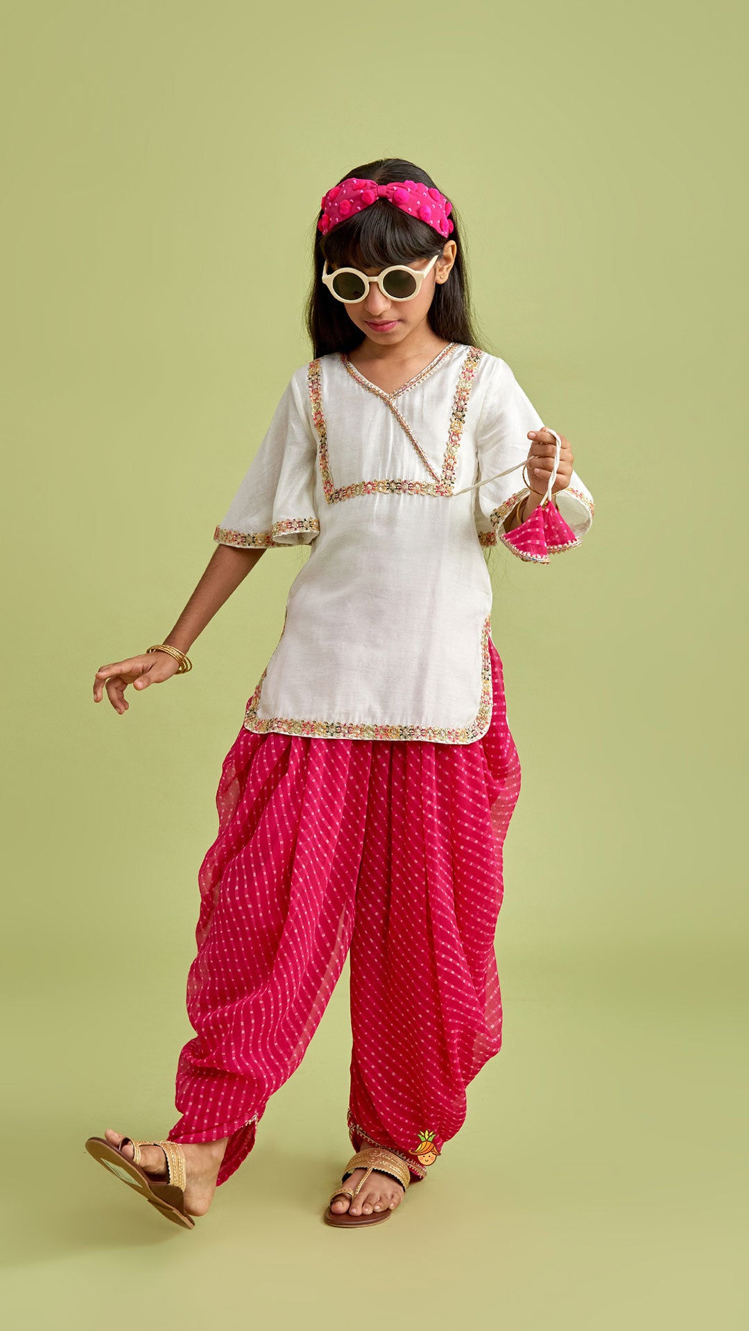 Pre Order: Off White Kurti And Leheriya Printed Pink Dhoti